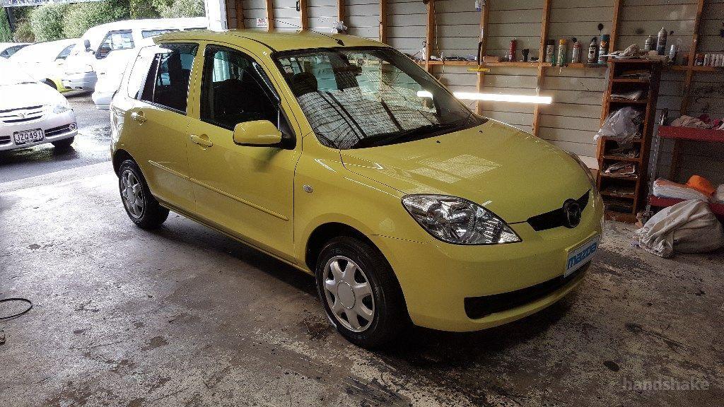 2006 Mazda Demio Auto very smart in yellow on handshake