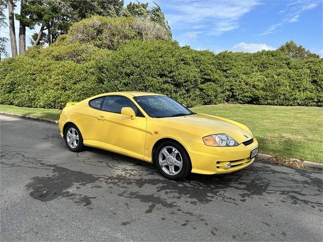 2003 Hyundai Tiburon 2.0 GL Coupe on handshake