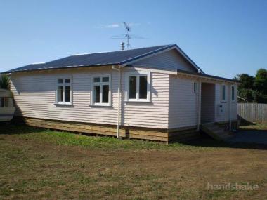 Tidy relocated home on outskirts of town